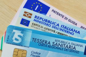 Close-up of italian driving licence card, identity card and health insurance card